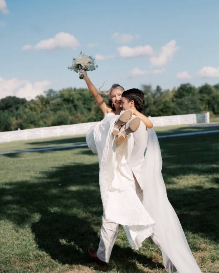 Instagram: a couple celebrating on the lawn, by Jessica Lapp