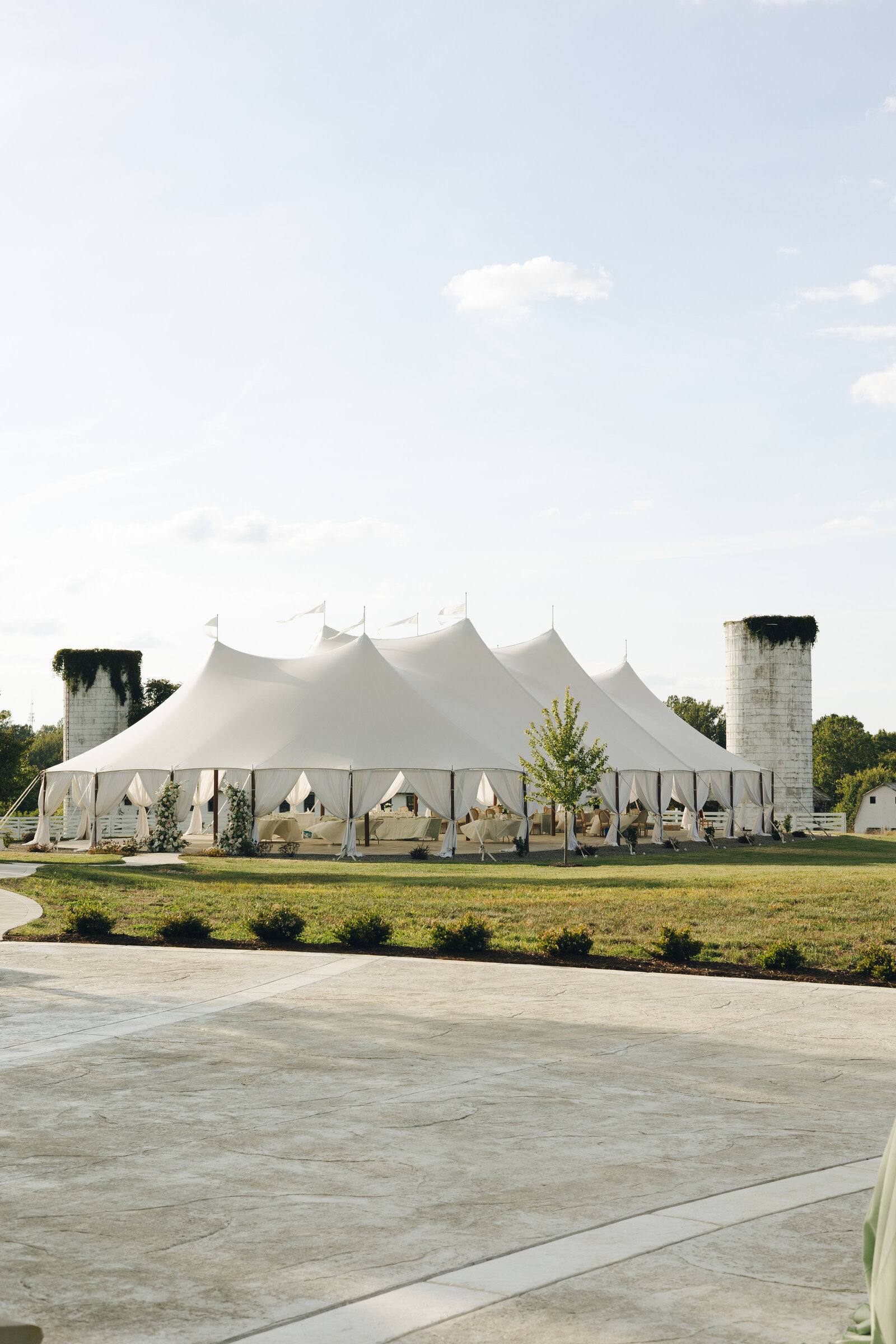 The sailcloth tent between the old silos