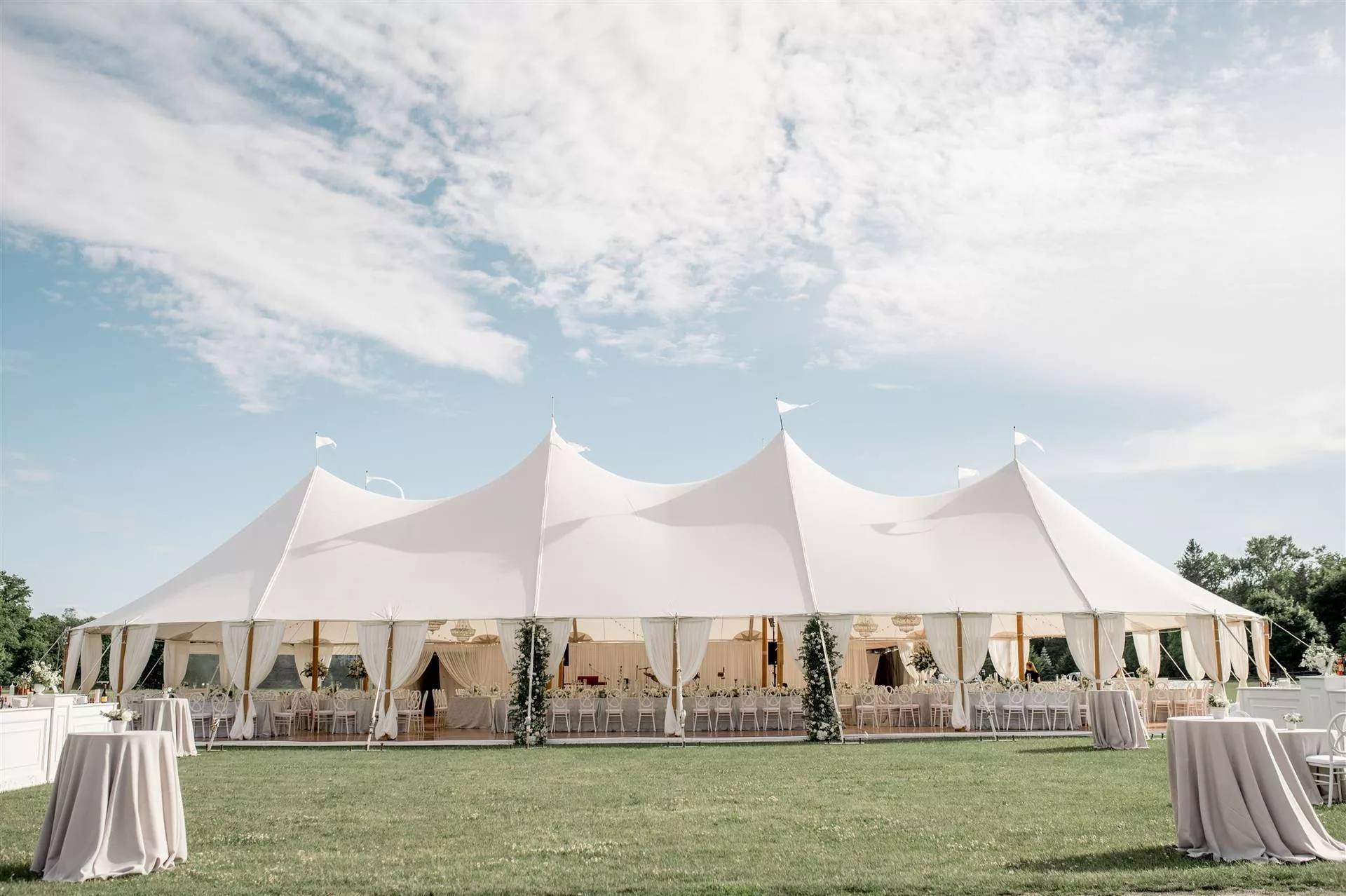 The sailcloth tent on the lawn on a sunny afternoon