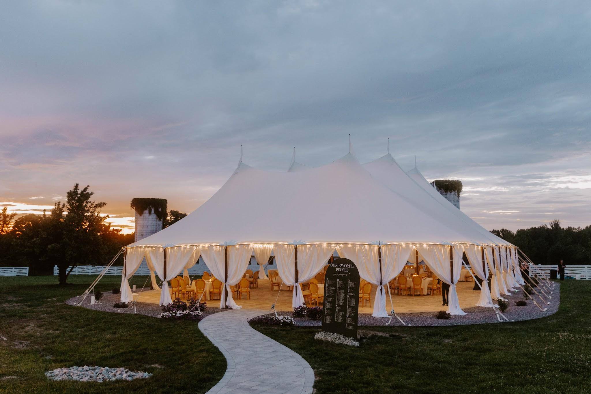 The sailcloth tent glowing at sunset