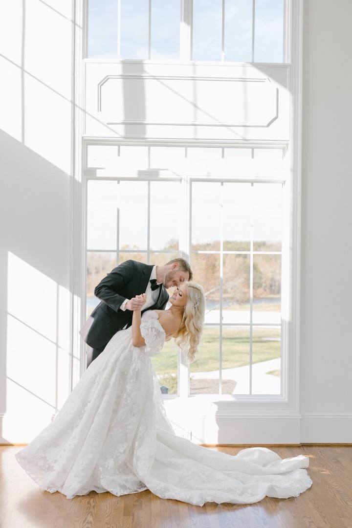 TikTok: a couple in the ballroom by the tall windows